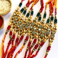 2 Stone Red & Green Beads Dora Rakhi for Brother ( Set Of 12 rakhis )